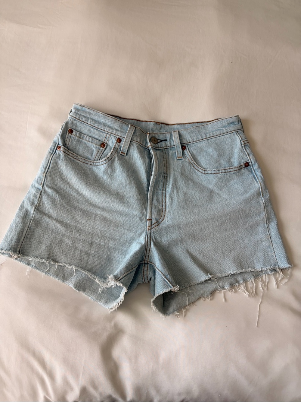 Levi's Light Wash Distressed Denim Shorts